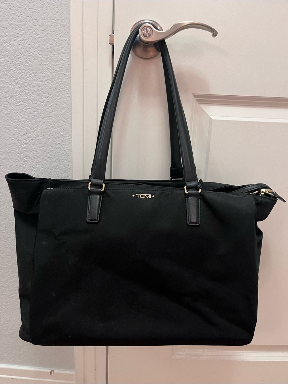 Tumi Black Nylon Tote with Leather Handles and Gold Accents